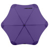 A purple BLUNT Classic Umbrella with a star-shaped canopy and a central hub, featuring a logo.