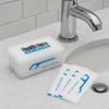 A container of dental floss picks in a white box with blue accents. Includes individual packets next to the box.
