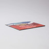 A 50mm x 50mm fridge magnet with a colourful design and a logo on it, featuring a flat edge.