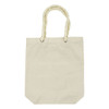 A cream tote bag with a textured, rope handle. Features a simple design and branding.