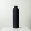 A drink bottle with a sleek, matte black finish and a round cap, featuring a logo.
