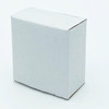 A small white cardboard box with a plain design, featuring a flap closure at the top.