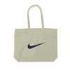 A cream tote bag with a black logo, featuring two handles for easy carrying.