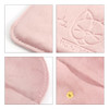 A pink velvet jewelry pouch with a cat design and a gold snap closure. Features smooth stitching and soft texture.