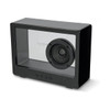 A black speaker with a transparent casing and a round speaker cone visible on one side, featuring control buttons underneath.