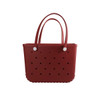 A red EVA beach bag with perforated design and two sturdy handles. It features a smooth, flexible body and rounded edges.