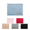 A collection of durable flat makeup bags in blue, pink, red, grey, black, and beige, featuring a gold zipper and logo.