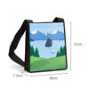 A custom sublimation crossbody bag featuring a scenic landscape print with mountains, water, and a sailboat. Black strap.