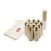 A set of wooden skittles numbered 1 to 10, with a white throwing stick and a storage bag.