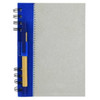 A grey recycled journal book with a blue cover and a pen attached, featuring a spiral binding.