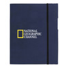 A navy blue A5 journal book with an elastic band and a logo on the front. It features a two-pocket design.