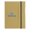 A large A5 journal book in a brown cover with a black elastic band and a logo on the front.