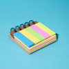 A Mini Bamboo Sticky Note Set featuring pink, yellow, and green sticky notes in a spiral-bound design.