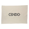 A cream cotton tea towel featuring a large black logo in the centre.