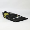 A black mesh carry bag containing yellow pickleballs, featuring a logo on the side.