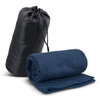 A navy fleece blanket rolled up next to a black carry bag, featuring a drawstring top.