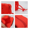 A red square silicone pouch with a zip closure and a corded handle, showcasing its texture and design details.