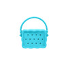 A turquoise silicone bag with a textured handle and holes, featuring a scalloped design.