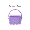 A silicone bag in lavender with a textured design and handle, featuring multiple holes for ventilation.