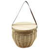 A natural woven basket with a round wooden lid and a brown shoulder strap. It features a textured finish.