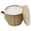 A wicker cooler basket in natural tones, with a light-coloured fabric lining and a wooden lid. It has leather handles.