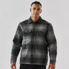 A men's black and grey plaid jacket with a Sherpa lining and two chest pockets, featuring a logo on the front.