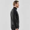 A men's knit jacket in black, featuring a high collar and a fitted design. It includes a logo on the garment.