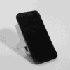 A wireless charging power bank in white, featuring a stand and a black face. It has a logo on the side.
