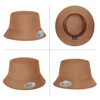A tan premium bucket hat featuring a label and a smooth finish, with a wide brim and a textured interior.