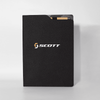 A black A4 notebook with a logo on the front and a secure pocket for storing documents or notes.