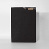 A black A4 notebook with a textured cover and an inner pocket. It features a logo on the front.