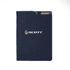 A navy blue notebook with a subtle texture and a logo on the front cover. It has a pocket for cards or notes.