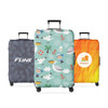Three suitcase covers in various designs: grey with wave patterns, a whimsical ocean theme, and a geometric orange pattern.