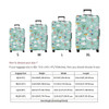 A suitcase cover in a light green colour with a playful pattern, featuring various travel-themed illustrations and a logo.