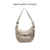 A beige crossbody bag with a logo and the word "Paradise" printed on the front. It features an adjustable strap.