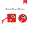 A red square silicone pouch with a paw print design and a round charm, both featuring a logo.