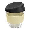 A drink bottle featuring a clear borosilicate glass body, cream silicone grip, and a black lid.