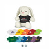 A white rabbit plush toy wearing a black shirt, alongside various colourful shirts in different shades.