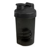 A drink bottle in dark grey with a secure lid and built-in mixing element, featuring a logo.