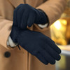Fleece gloves in black, featuring a snug fit and adjustable wrist closure, suitable for cold weather.