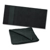 A dark green beach towel displayed flat, with a folded version showing its texture and thickness. It features a logo.