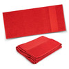 A red terry towel featuring a smooth strip and a folded design, showcasing its soft texture. Contains branding.