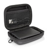A black power bank is neatly enclosed in a zippered case with a mesh pocket and cables inside.