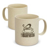 A coffee mug in a speckled cream colour with a simple branding logo on the front.