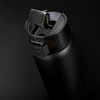 A drink bottle in matte black with a secure lid and a built-in sipping spout, featuring a logo.