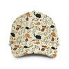 A cap featuring a playful pattern of various cats in cream, orange, and black tones. It has a logo on the front.