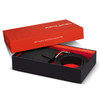 A black leather wallet and belt gift set in a stylish box, featuring a branded logo.