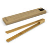 Bamboo serving tongs in a natural finish with a branded handle, presented beside a simple kraft packaging box.