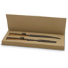 A wooden keepsake carving set in a brown gift box with two knives and protective sheaths.