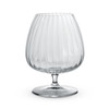 A clear, ribbed cognac glass with a round base, showcasing an elegant design.